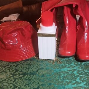 Red plastic boots with jacket  with shorts and purse and hat